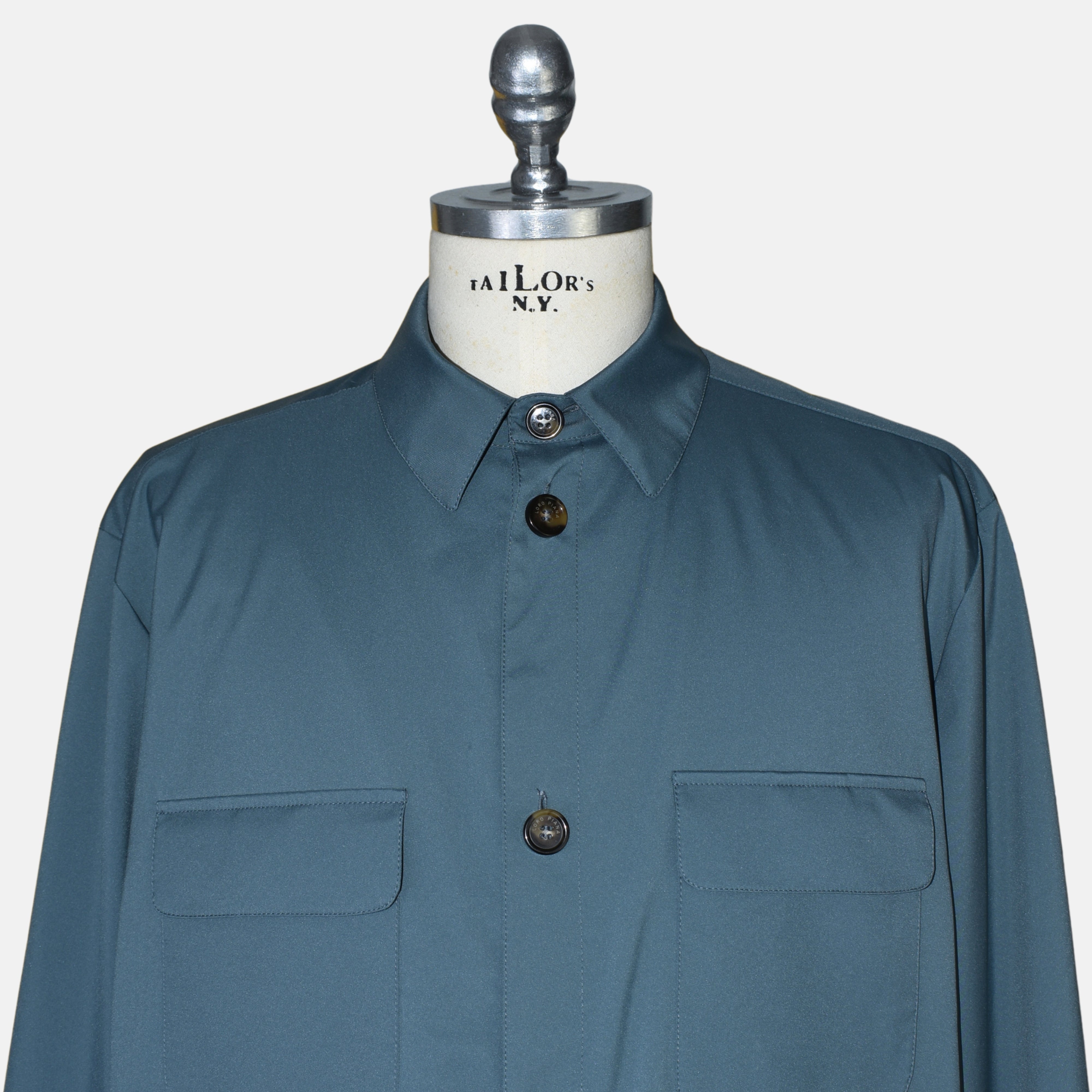 Close-up of the collar and button placket on the Loro Piana Storm System jacket