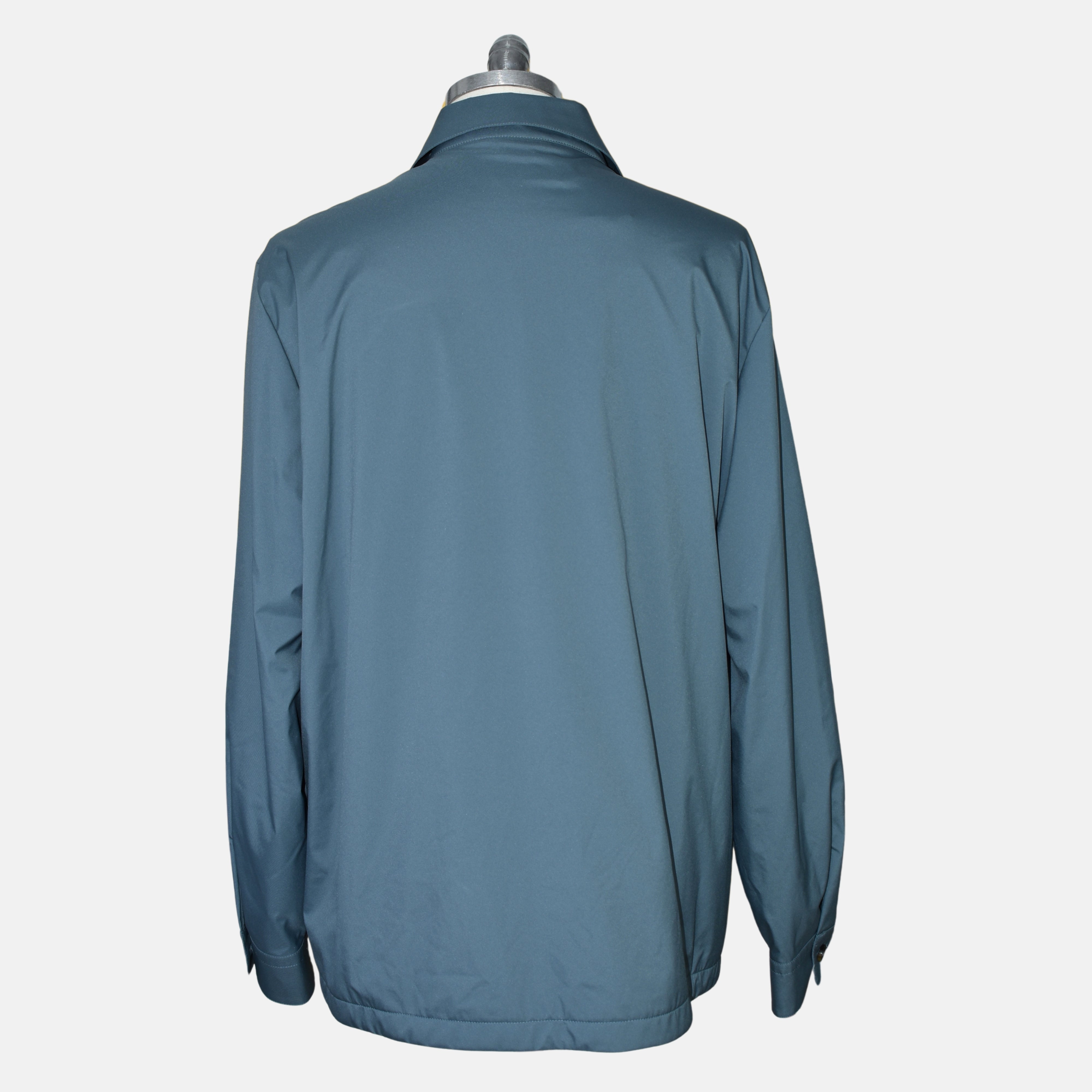 Close-up of the button cuff and hem on the Loro Piana Storm System jacket