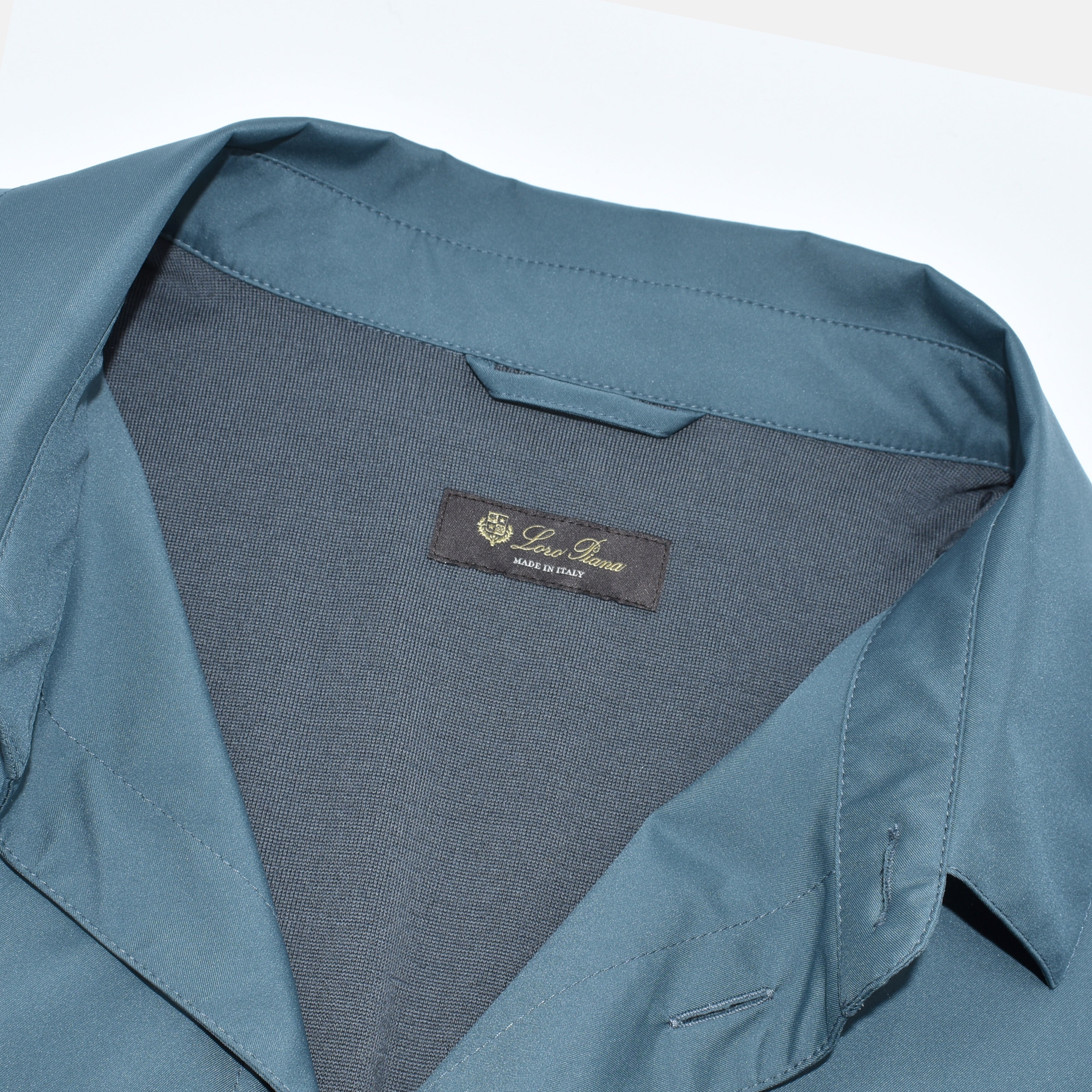Close-up of the Loro Piana label sewn into the virgin wool lining