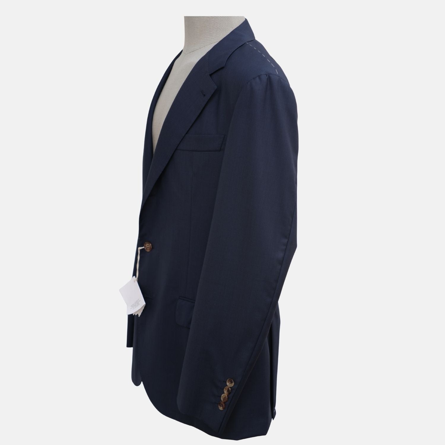 Side profile of the Brunello Cucinelli navy wool suit jacket on a mannequin
