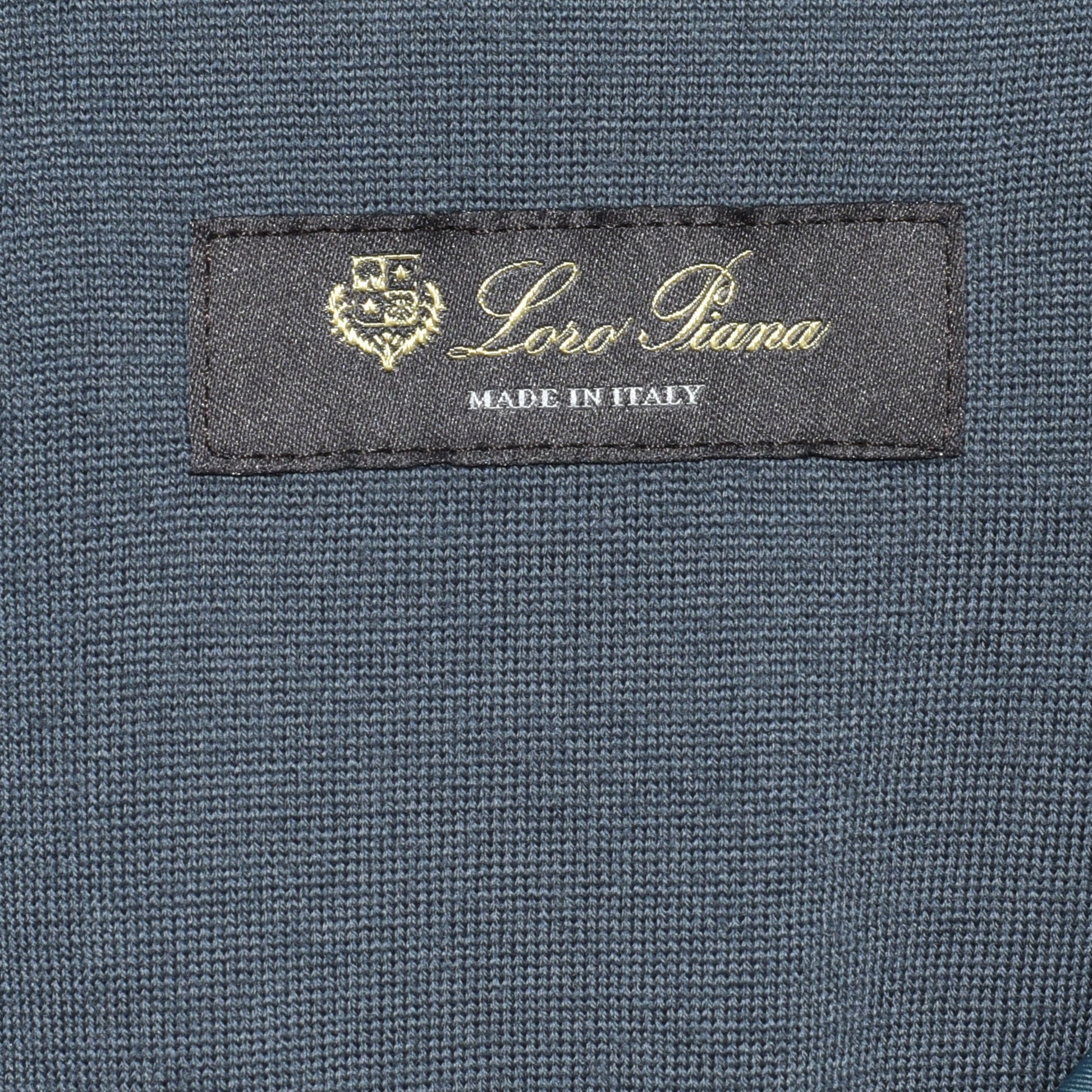 Loro Piana size and composition label: XXL, polyamide-nylon shell, virgin wool lining