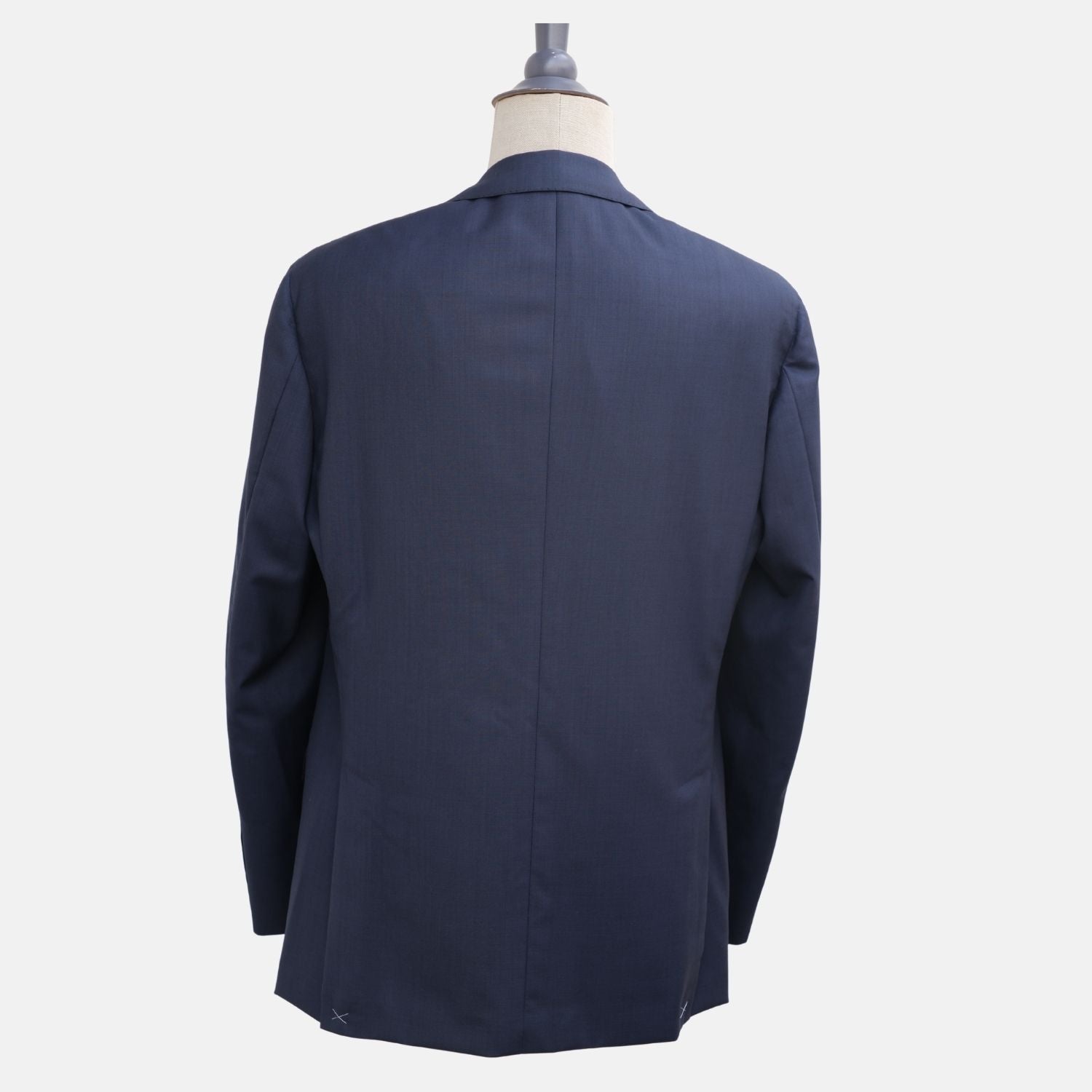Back view of the Brunello Cucinelli navy wool suit jacket on a mannequin