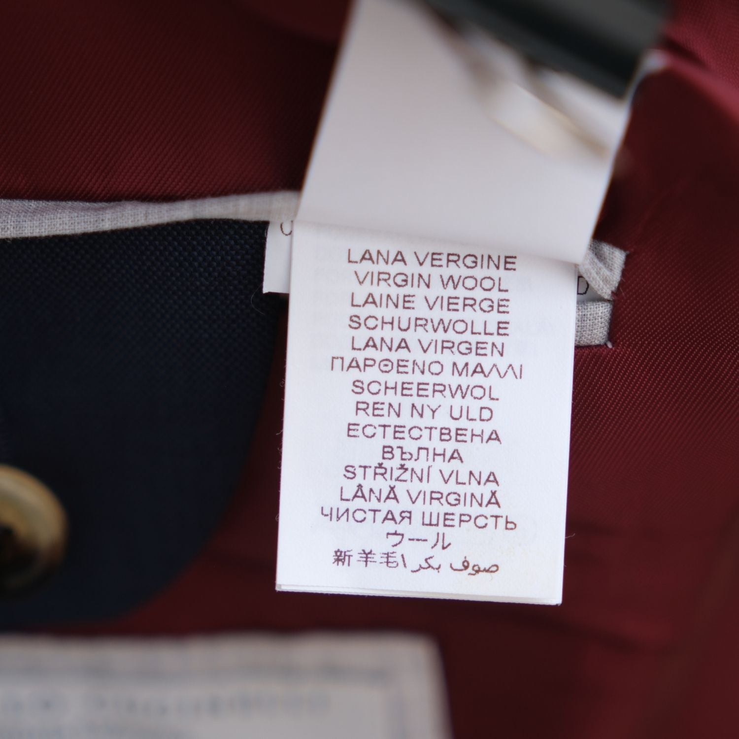 Close-up of the suit jacket's virgin wool composition label