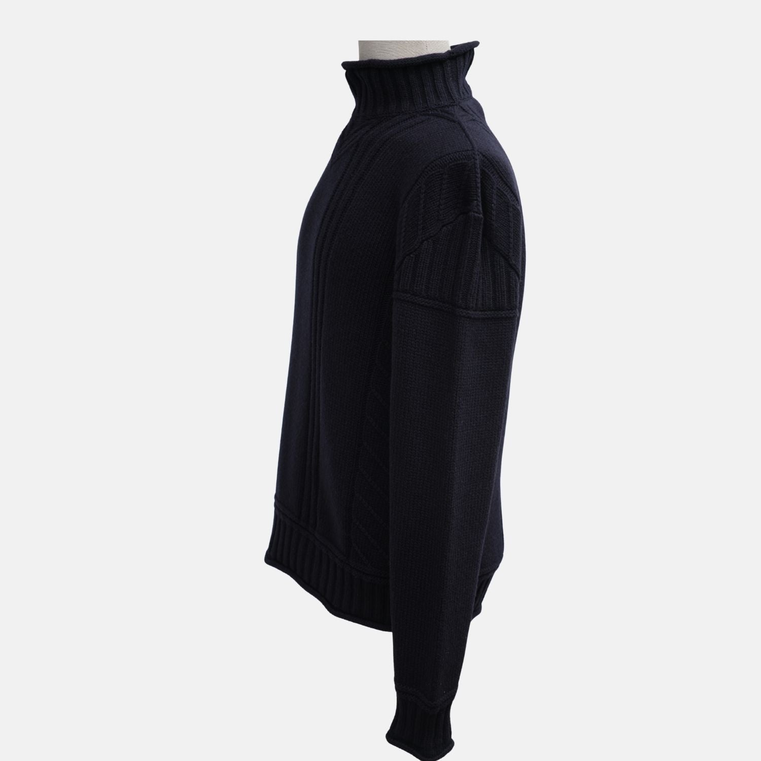 Side profile of the Loro Piana navy cashmere turtleneck showing the high ribbed collar
