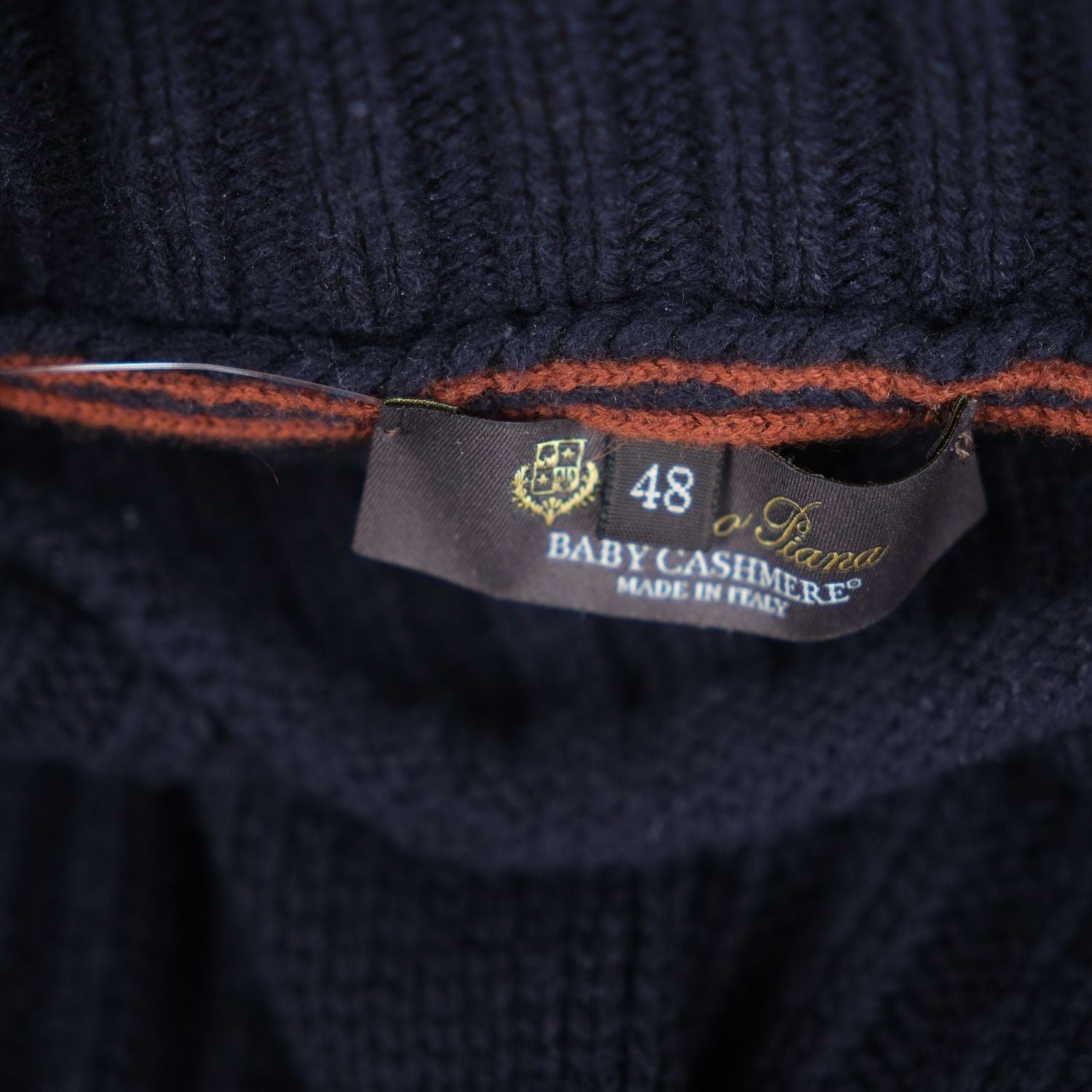 Close-up of the Loro Piana size label showing size 48