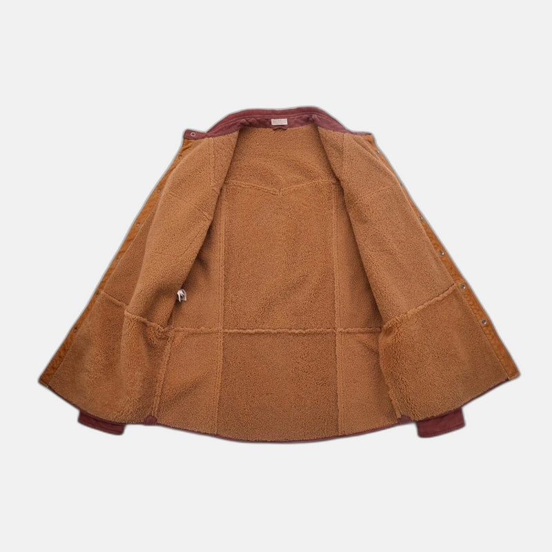 Brunello Cucinelli shearling trucker jacket open to show the plush camel shearling lining