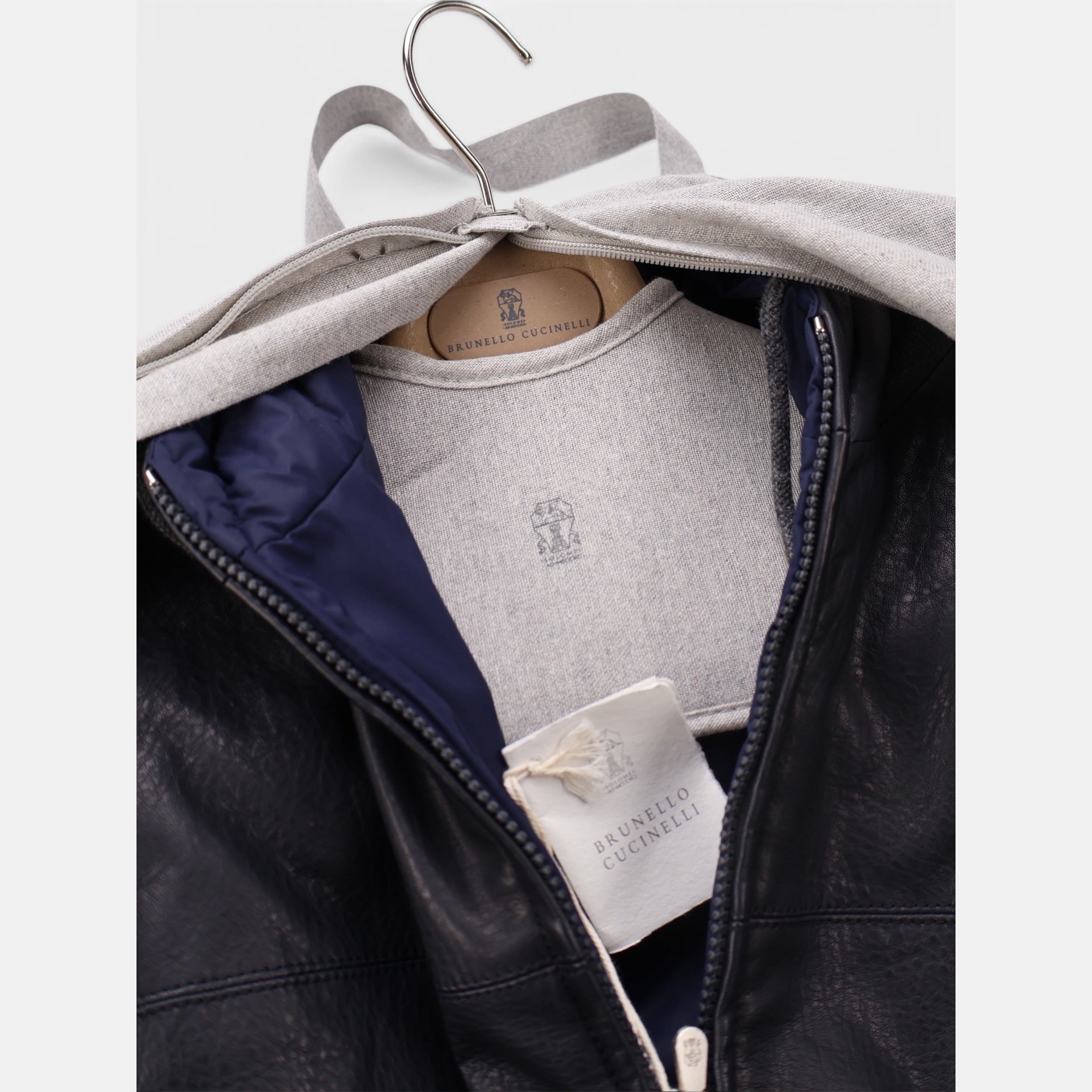 Brunello Cucinelli black and navy reversible hooded bomber jacket in calfskin leather