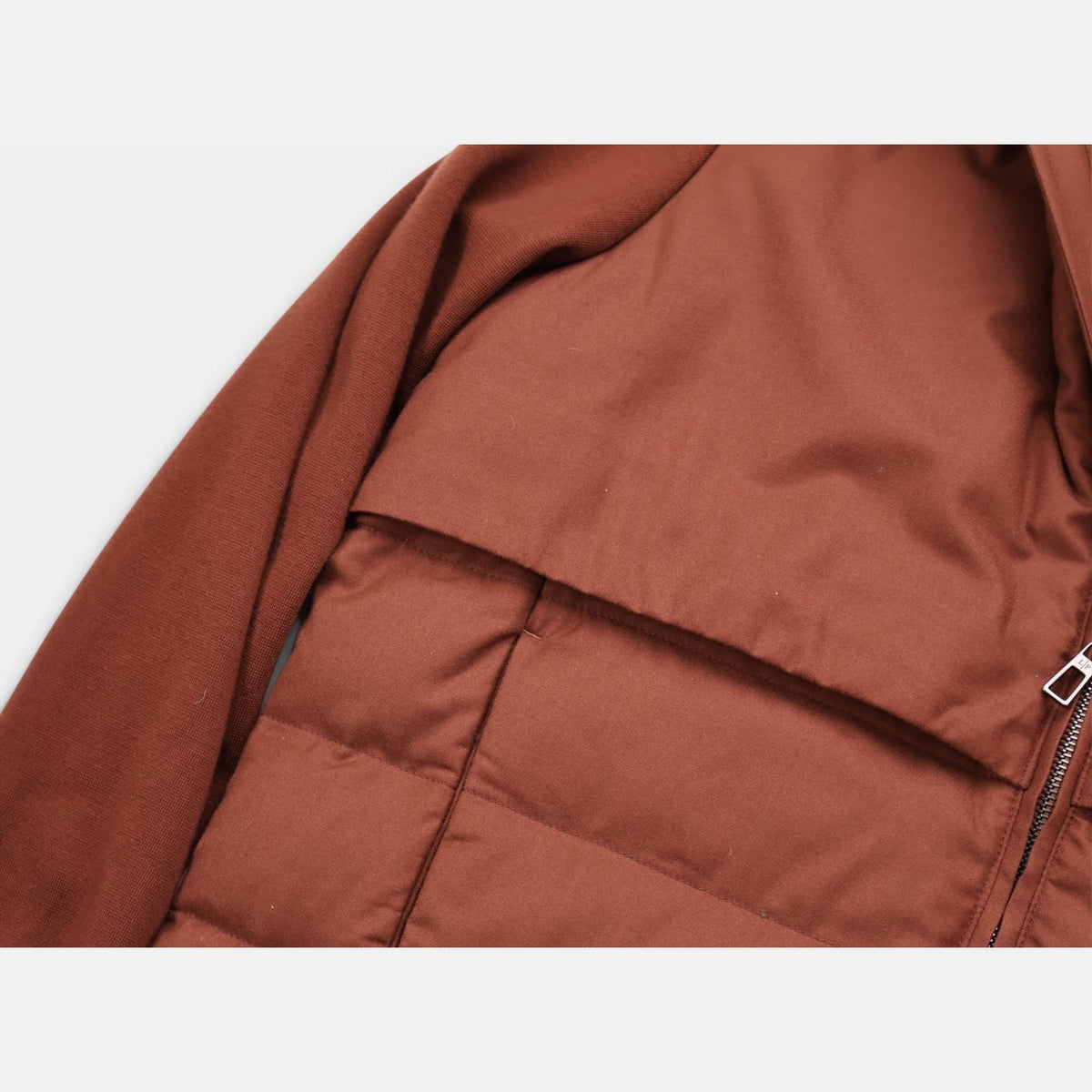 Loro Piana Gift of Kings down jacket in brick, knit merino wool