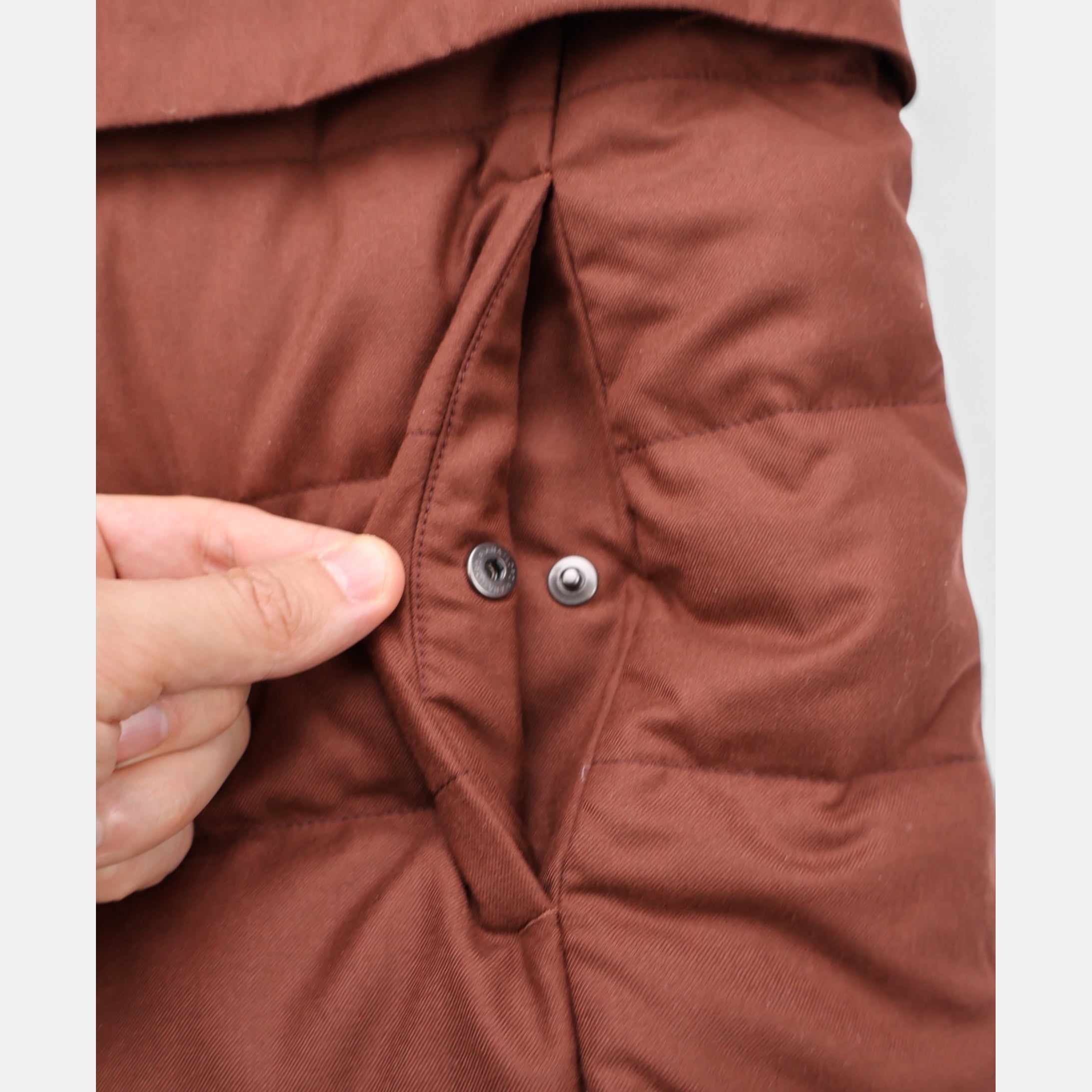 Loro Piana Gift of Kings down jacket in brick, knit merino wool