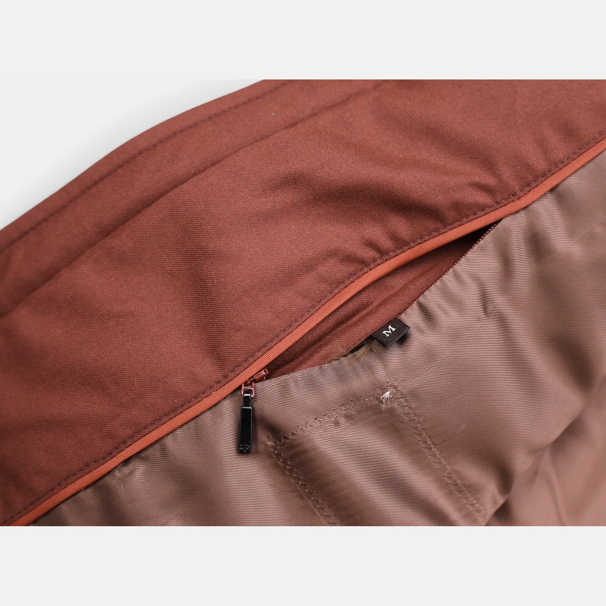 Loro Piana Gift of Kings down jacket in brick, knit merino wool