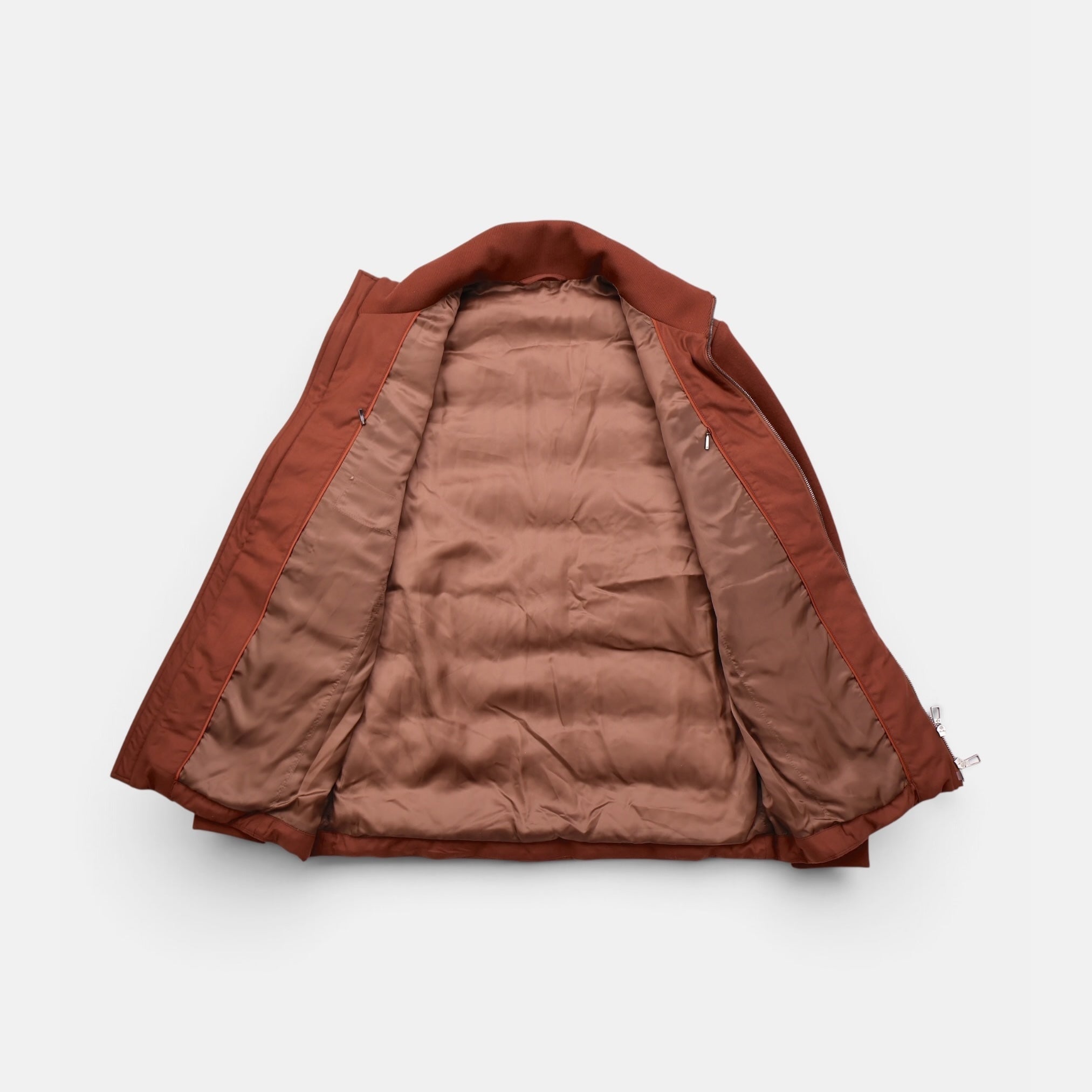 Loro Piana Gift of Kings down jacket in brick, knit merino wool
