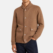 Man wearing a Loro Piana camel jersey bomber jacket with shawl collar and snap-button placket